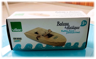 A box of a toy boat

Description automatically generated